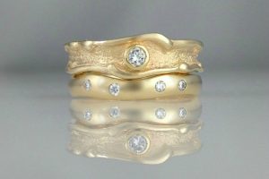 Sandcast Ocean Wedding Ring Set