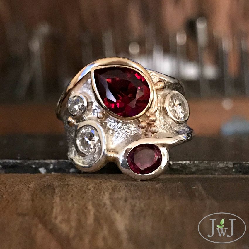 sandcast ruby swirl ring